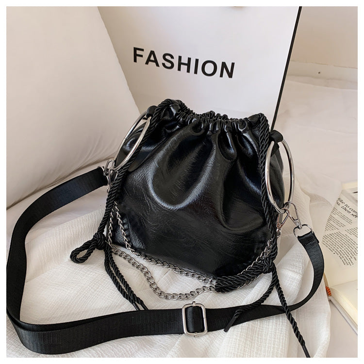 Pleated portable shoulder bag