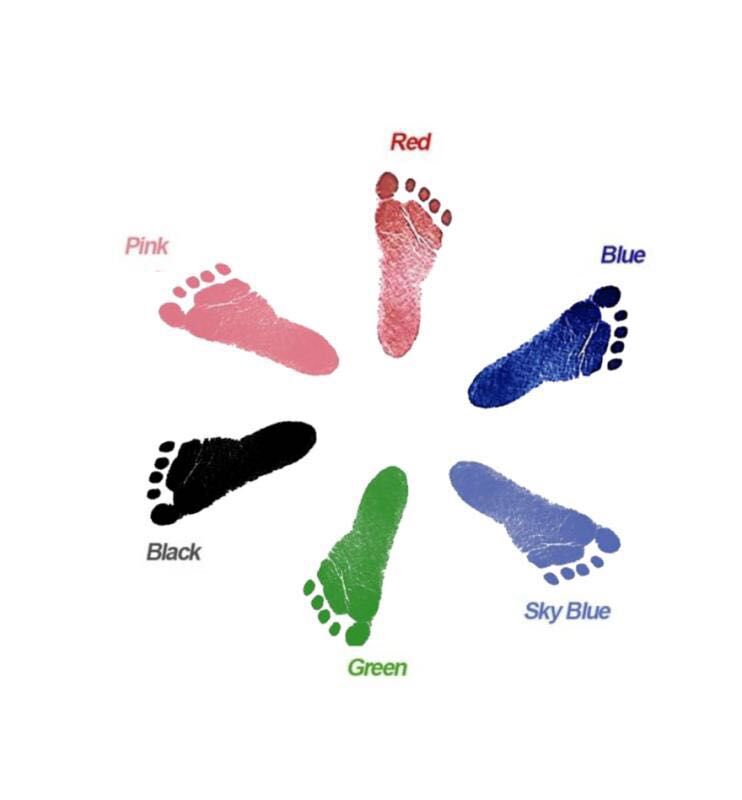 Baby hands and feet with oil